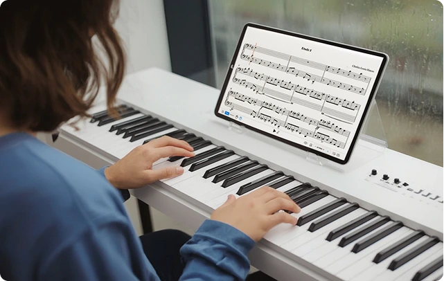 Person playing digital piano